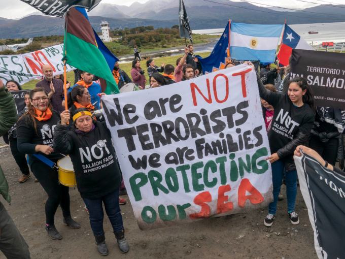 Demonstrators protesting against plans to establish salmon farms in the area. Photo: Heiko Junge, NTB scanpix 