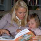 Crown Princess Mette-Marit and Princess Ingrid Alexandra reading (Photo: Knut Kollandsrud, The Royal Court)