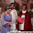 Crown Princess Victoria of Sweden lights her candle. Photo: Lise Åserud / NTB scanpix  Photo: Lise Åserud / NTB scanpix