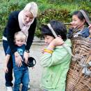 Speaking with local children who are on their way to fetch grass for their families' cows (Photo: The Royal Court)