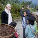 Speaking with local children who are on their way to fetch grass for their families' cows (Dzongu, Sikkim). Published 21.01.2011 as handout picture from The Royal Court. For editorial use only, not for sale. Photo: Kristi Marie Skrede, the Norwegian Broadcasting Corporation / The Royal Court. Image size: 4288 x 2848 px and 3,28 Mb.