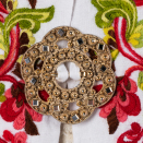 A copy of a filigree brooch from The Queen's family adorns the bunad shirt. Photo: Øivind Möller Bakken, The Royal Court