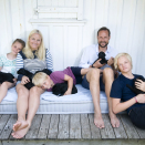 With the puppies. Published 12.07.2013. Handout pictures from the Royal Court. For editorial use only &#150; not for sale. Photo: . Foto: Veronica Melå / Utenfor Allfarvei AS / the Royal Court.