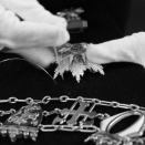 Silje Nome Schiander of the Royal Court prepares the Order of St Olav for the exhibitions. Published 18.01.2012. Handout picture from the Royal Court. For editorial use only, not for sale. Photo: Liv Osmundsen / The Royal Court. Size: 3786 x 2639 px and 4,07 Mb.