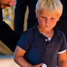 23 July: Crown Prince Haakon and Prince Sverre Magnus lighting candles in Oslo Cathedral (Photo: Vegard Grøtt / Scanpix)
