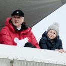Prince Sverre Magnus and Princess Ingrid Alexandra watch large hill ski jump with their grandfather The King (Photo: Lise Åserud / NTB scanpix)