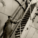 It became evident that Norway, even with the support of our allies, was unable to withstand the German forces. King Haakon had to make the difficult decision of leaving the country. On June 7 1940, King Haakon and Crown Prince Olav boarded the British cruiser <i>Devonshire</i> (Photo: The Royal Court Photo Archives)