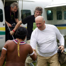 The King is greeted by a representative from the Yanomami Indians on the grassy runway. (Photo: Rainforest Foundation Norway / ISA Brazil)