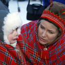 Crown Princess Mette-Marit with Nils Åke Joakimsener who found it very, very cold that morning (Photo: Lise Åserud, Scanpix)