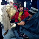 18 February: Crown Princess Mette-Marit meets senior citizens gathered around the fire for coffee outside Lian Restaurant in Trondheim. They take part in the Joy of life project. (Photo: Christian Lagaard, The Royal Court)