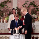 The Princess' brothers, Prince Sverre Magnus and Marius Borg Høiby, light their candles. Photo: Lise Åserud / NTB scanpix  Photo: Lise Åserud / NTB scanpix
