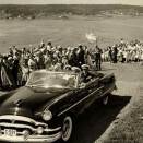 The King reached the city of Tønsberg 1 July. Here travelling up Castle Hill, with the Royal Yacht on the fjord behind (The Royal Court Archives)