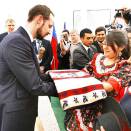 The Crown Prince received a poncho, specially made, as a gift from the village closest to La Confluencia (Photo: Lise Åserud, Scanpix)